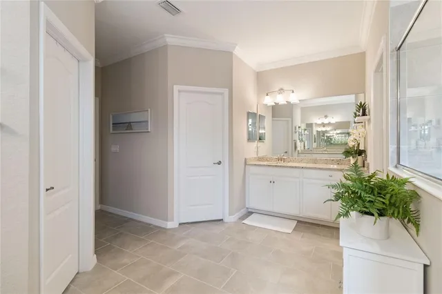 a bed room with a bed and window