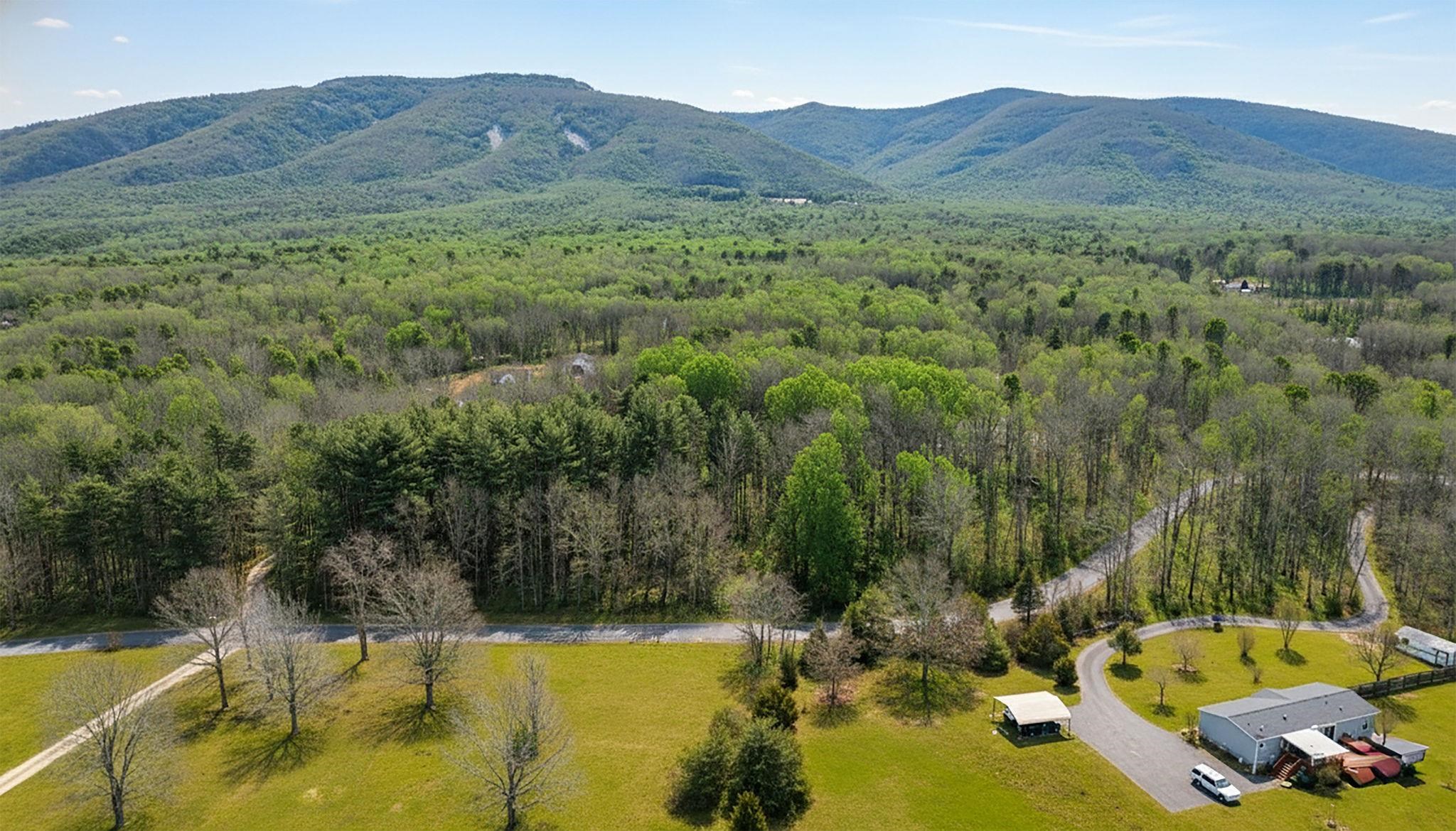 Tbd Kaolin Spring Lane Greenville, VA 24440 - Photo 14 of 32 a view of a lake with mountains in the background