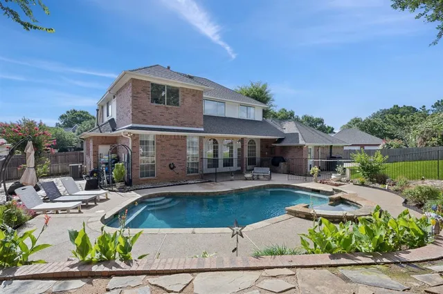 a house view with a garden space