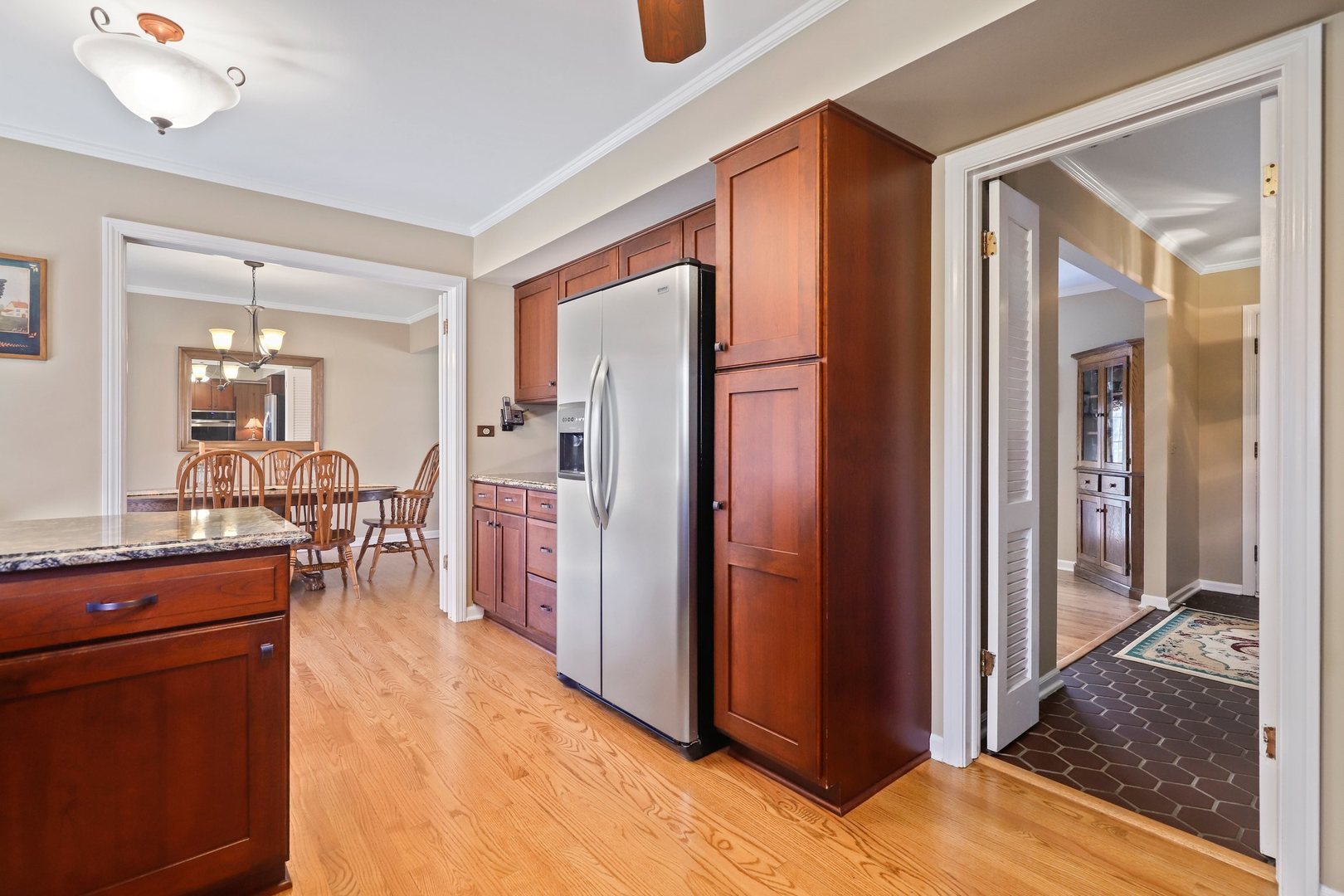 303 Roberts Road Inverness, IL 60067 - Photo 14 of 48 a very nice looking room with many windows and furniture