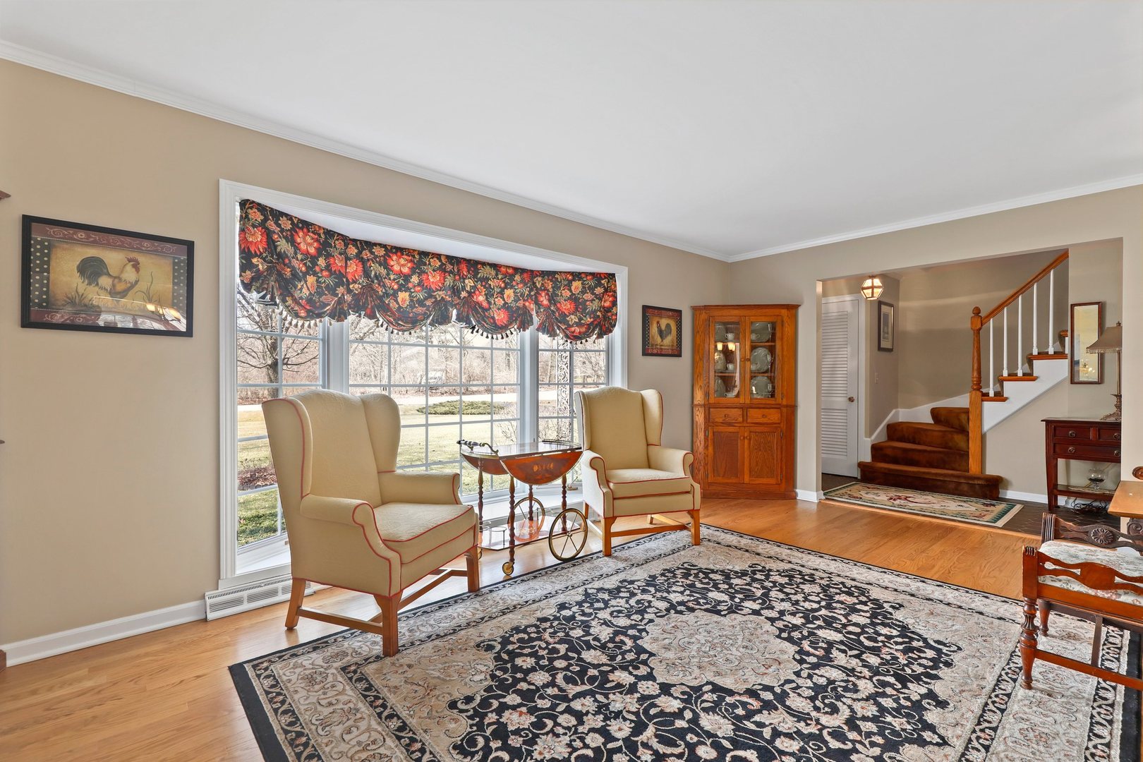 303 Roberts Road Inverness, IL 60067 - Photo 21 of 48 a living room with furniture and a rug
