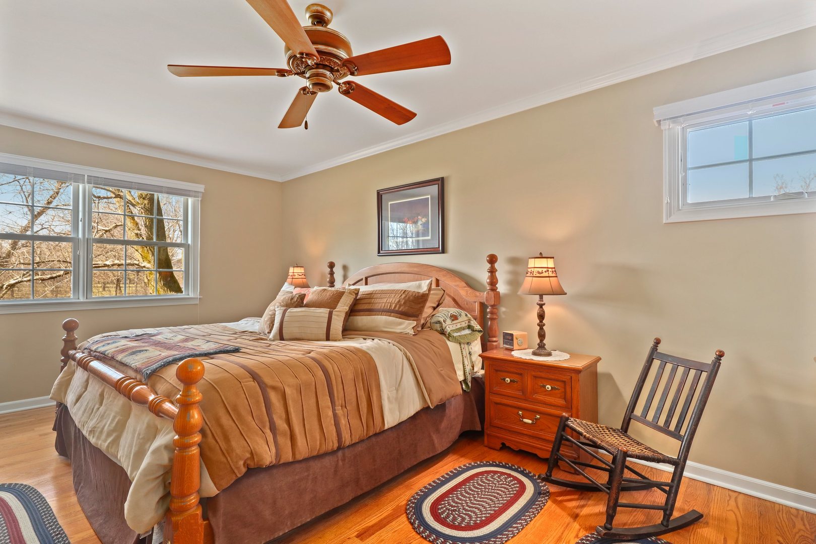 303 Roberts Road Inverness, IL 60067 - Photo 24 of 48 a bed room with a bed and a chandelier