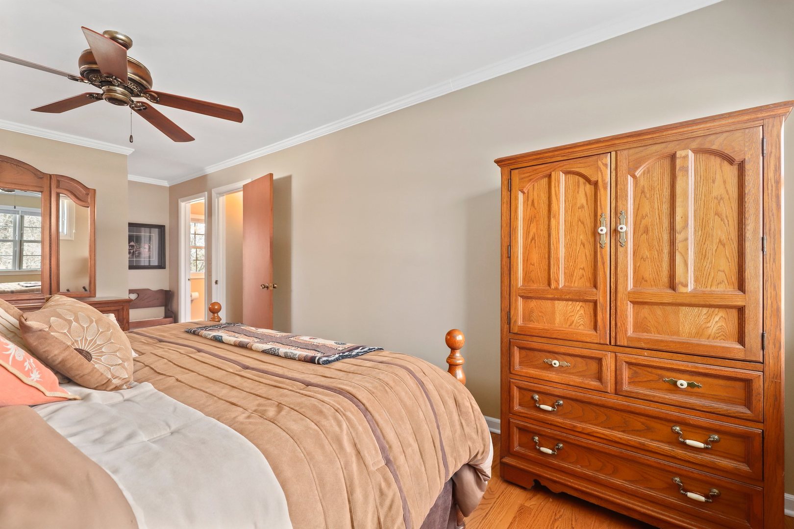 303 Roberts Road Inverness, IL 60067 - Photo 25 of 48 a bedroom with a bed and wooden floor