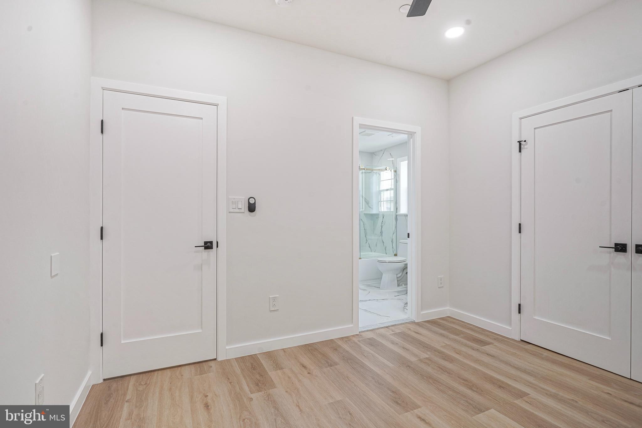 1145 Tasker Street Philadelphia, PA 19148 - Photo 17 of 58 a view of an empty room with wooden floor
