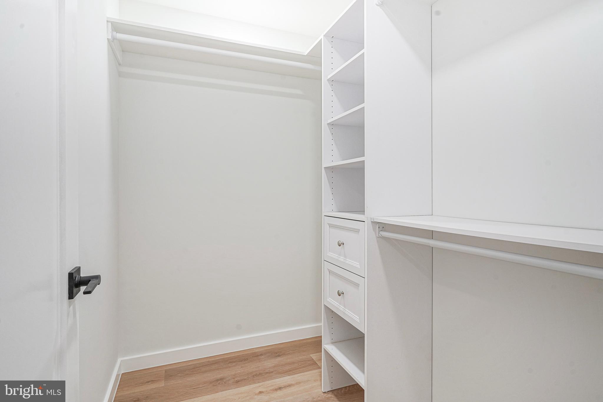 1145 Tasker Street Philadelphia, PA 19148 - Photo 33 of 58 a view of walk in closet with empty racks