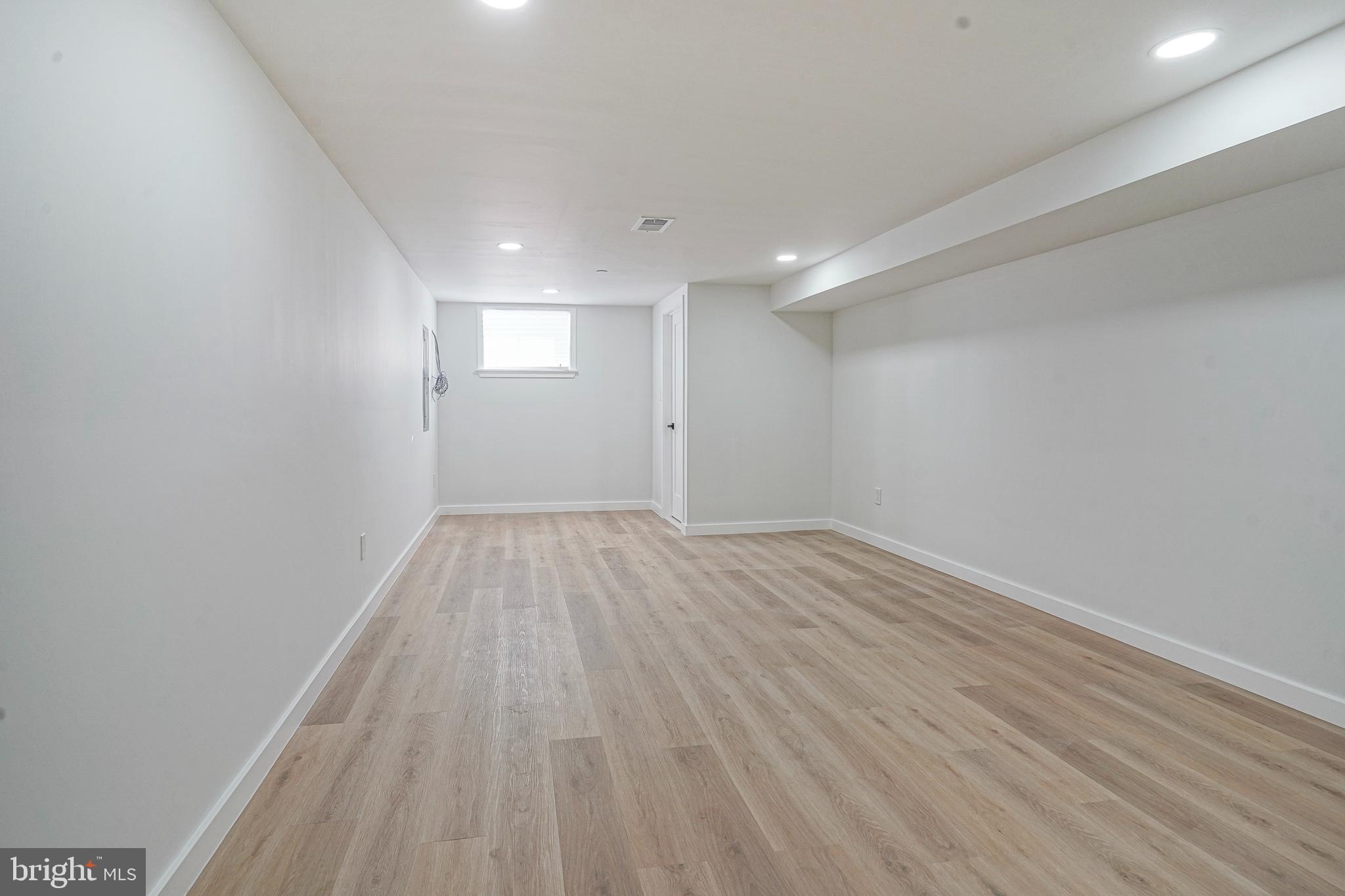 1145 Tasker Street Philadelphia, PA 19148 - Photo 41 of 58 a view of empty room with wooden floor