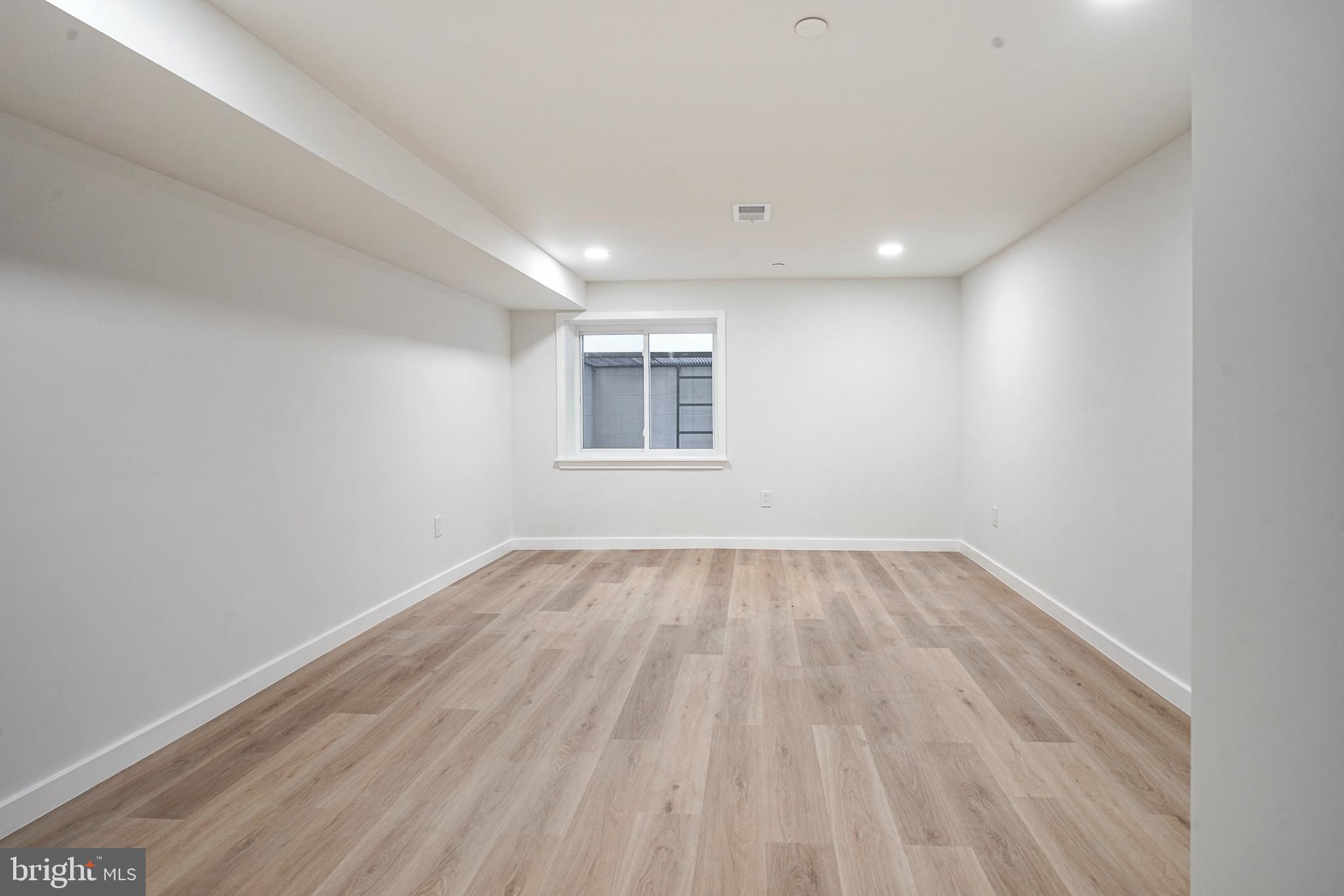 1145 Tasker Street Philadelphia, PA 19148 - Photo 42 of 58 a view of an empty room and a window