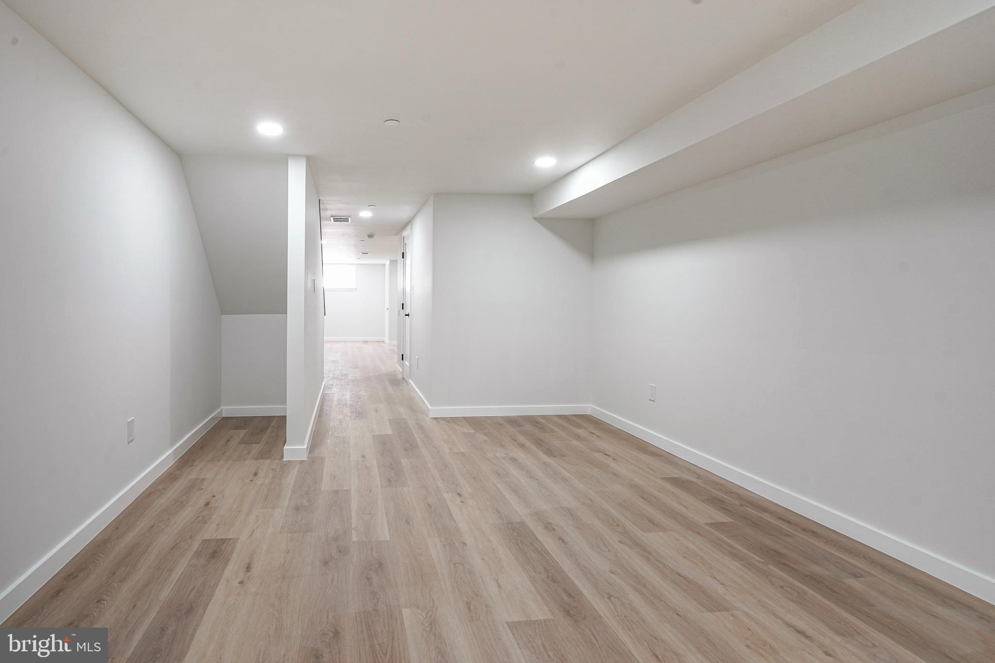 1145 Tasker Street Philadelphia, PA 19148 - Photo 43 of 58 a view of empty room with wooden floor