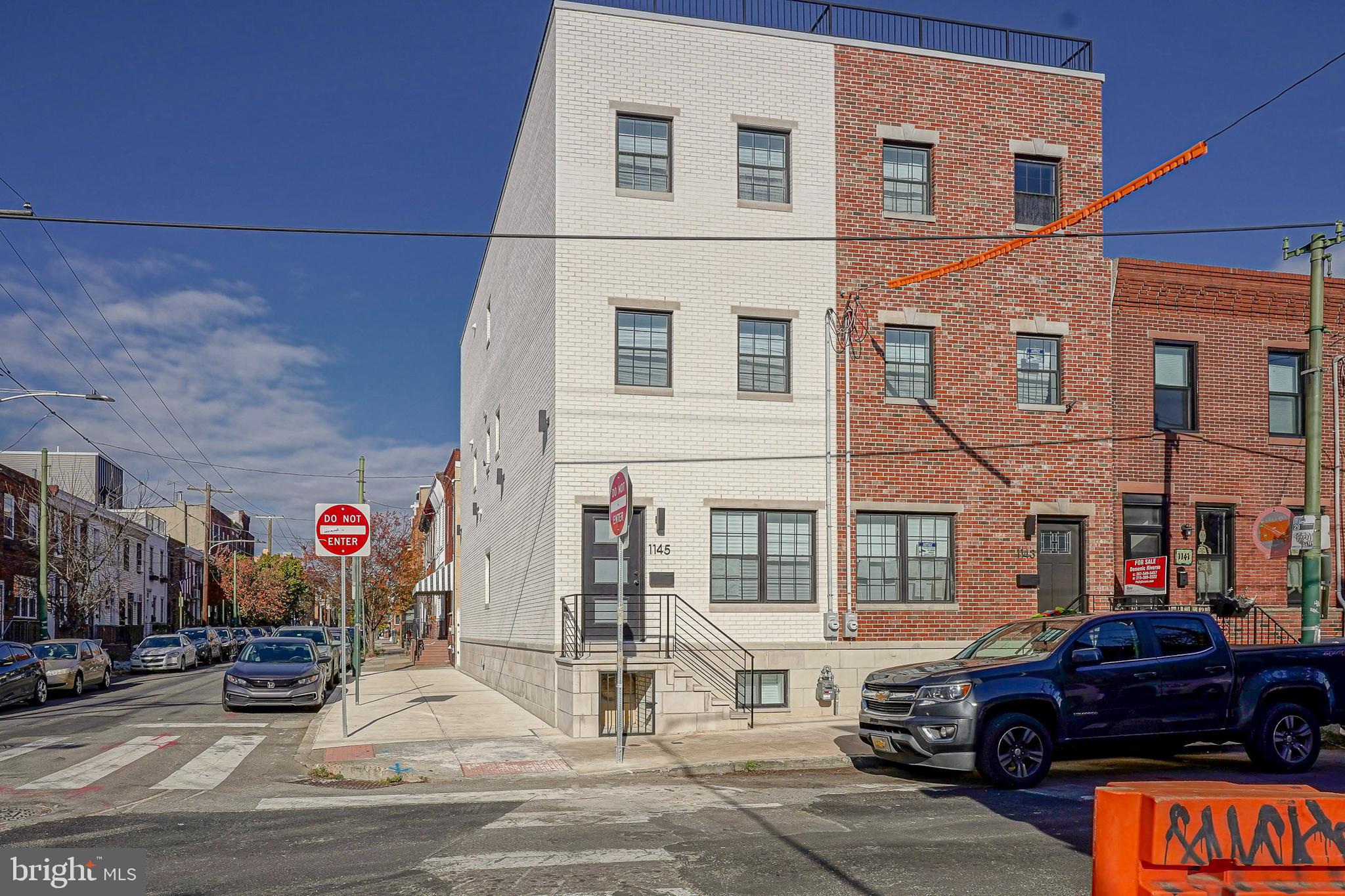 1145 Tasker Street Philadelphia, PA 19148 - Photo 44 of 58 a car parked in front of a building