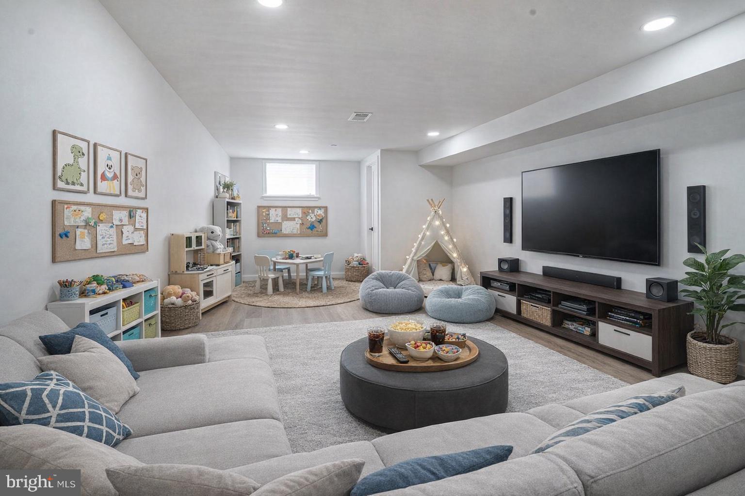 1145 Tasker Street Philadelphia, PA 19148 - Photo 47 of 58 a living room with furniture and a flat screen tv