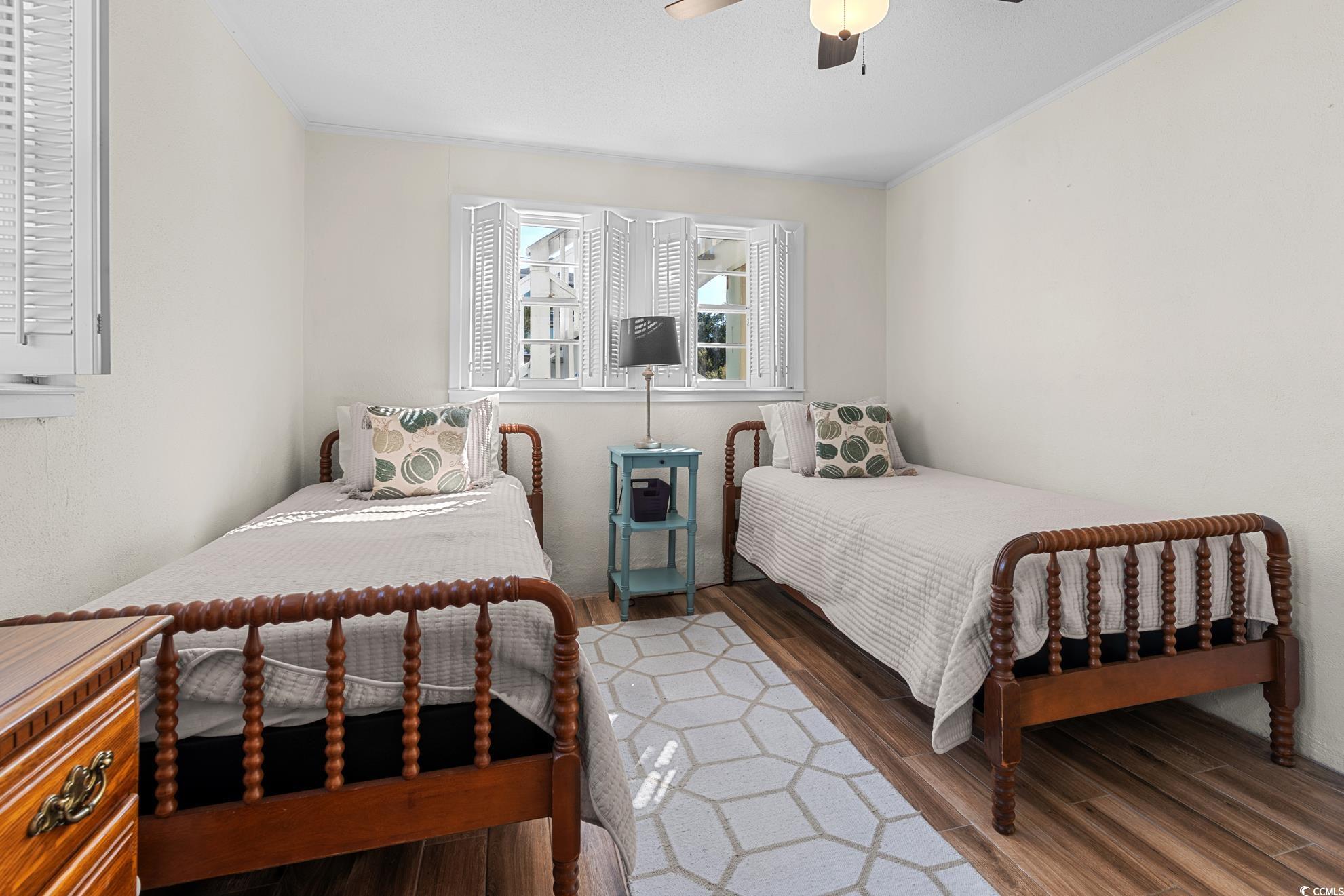 342 State Rd S-26-530 Murrells Inlet, SC 29576 - Photo 31 of 38 Bedroom with hardwood / wood-style floors, ceiling fan, and crown molding