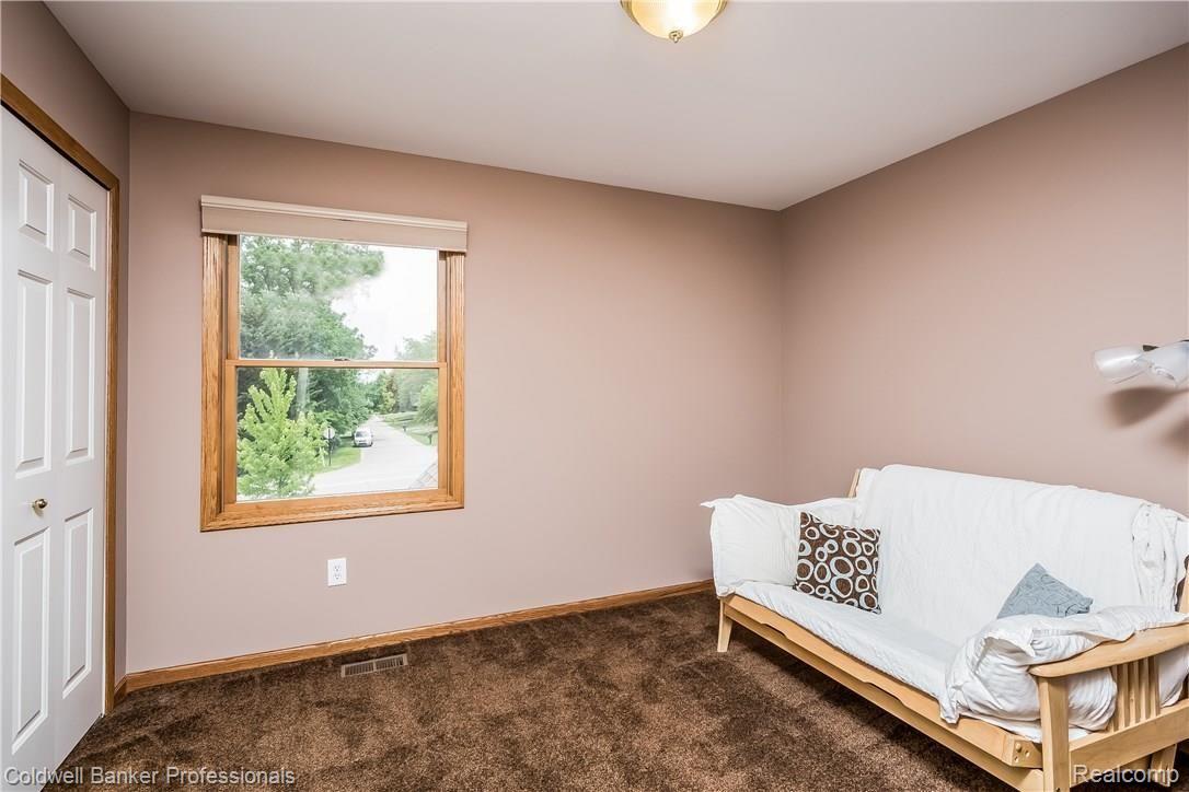 8483 Lee Road Brighton, MI 48116 - Photo 31 of 41 Bedroom 4 has a nook across from the window perfect for a reading spot