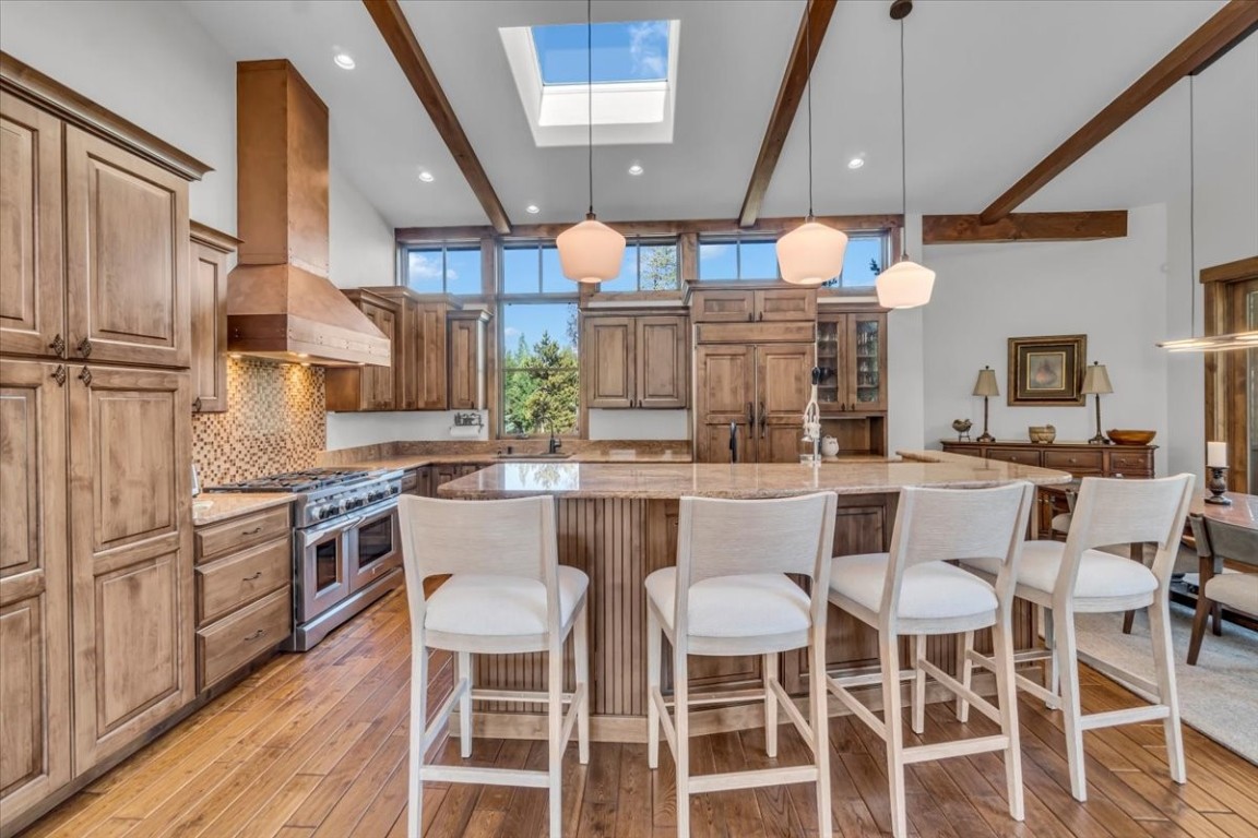 73 Last Chance Lane Dillon, CO 80435 - Photo 11 of 46 a kitchen with cabinets and chairs