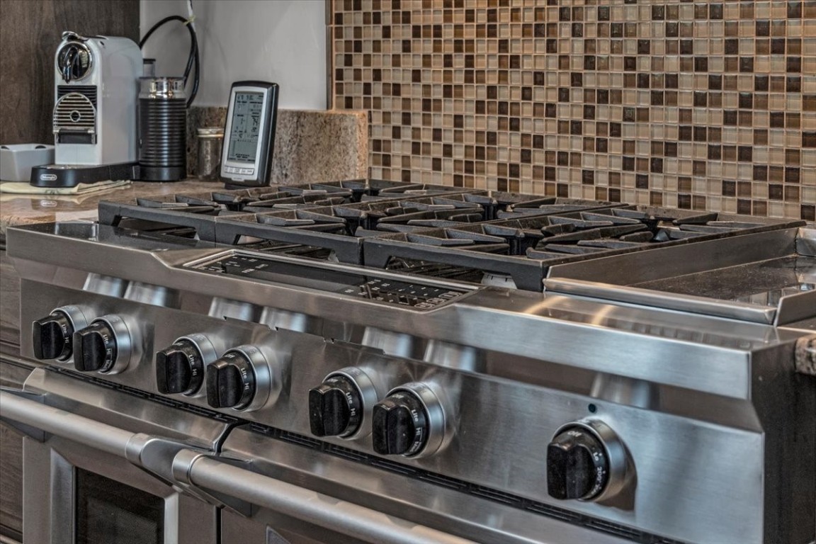 73 Last Chance Lane Dillon, CO 80435 - Photo 14 of 46 closeup of a stove top oven sitting inside of a kitchen