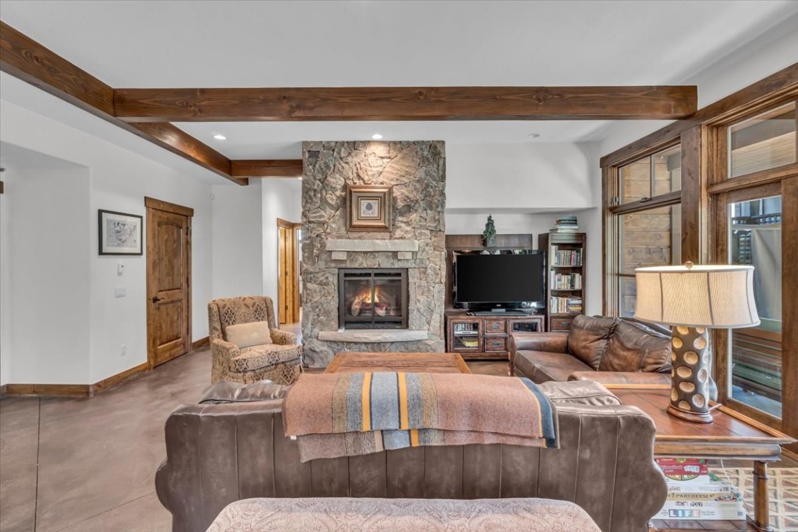 73 Last Chance Lane Dillon, CO 80435 - Photo 21 of 46 a living room with furniture and a fireplace