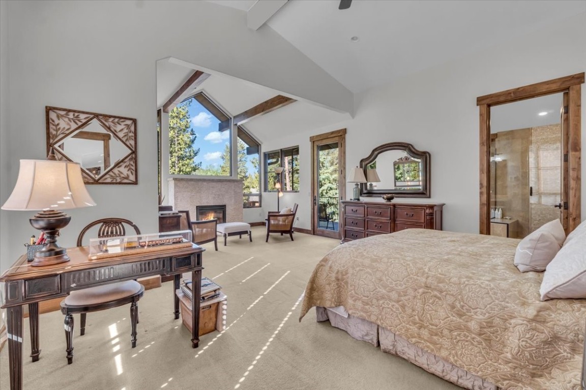 73 Last Chance Lane Dillon, CO 80435 - Photo 23 of 46 a bedroom with a bed a large window with table and chairs