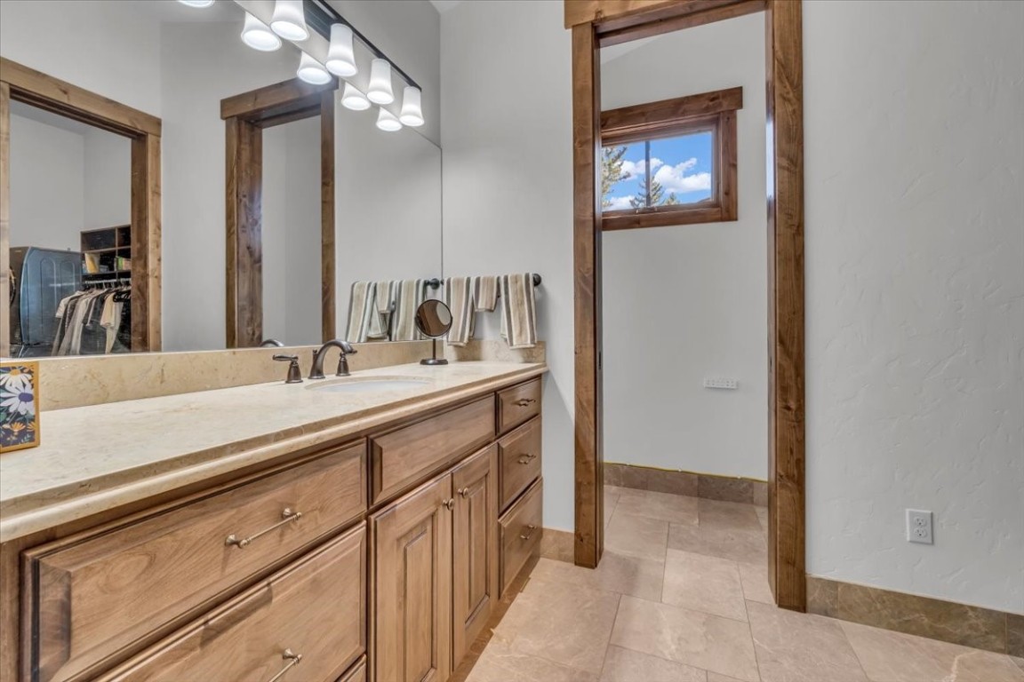 73 Last Chance Lane Dillon, CO 80435 - Photo 26 of 46 a bathroom with a sink and a mirror
