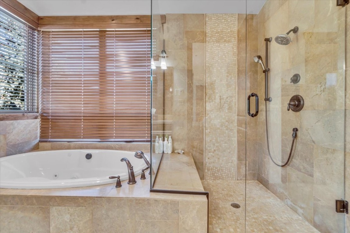 73 Last Chance Lane Dillon, CO 80435 - Photo 31 of 46 a bathroom with a bath tub and a shower