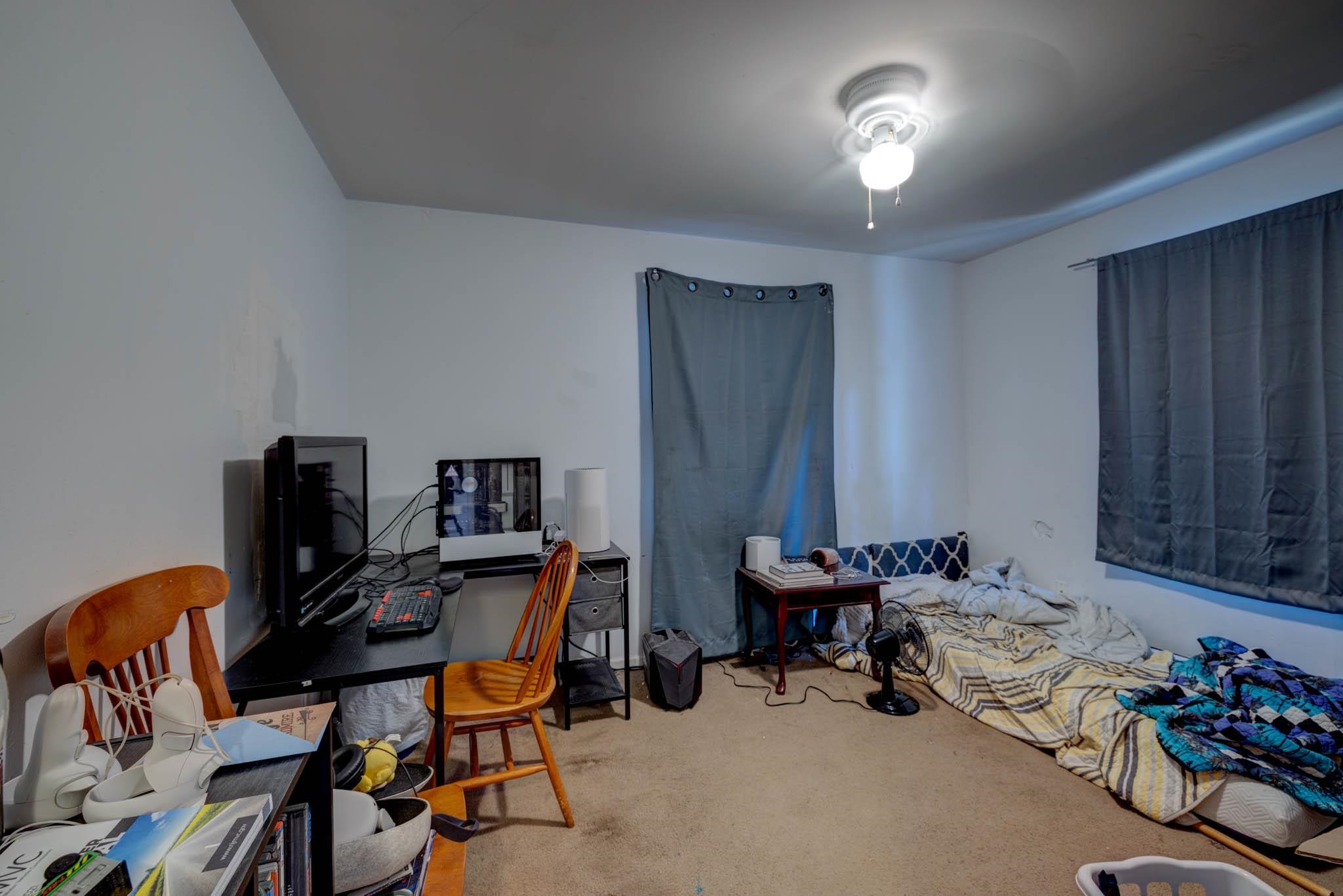 106 Delair Road Cape May, NJ 08204 - Photo 12 of 28 a room with furniture and wooden floor