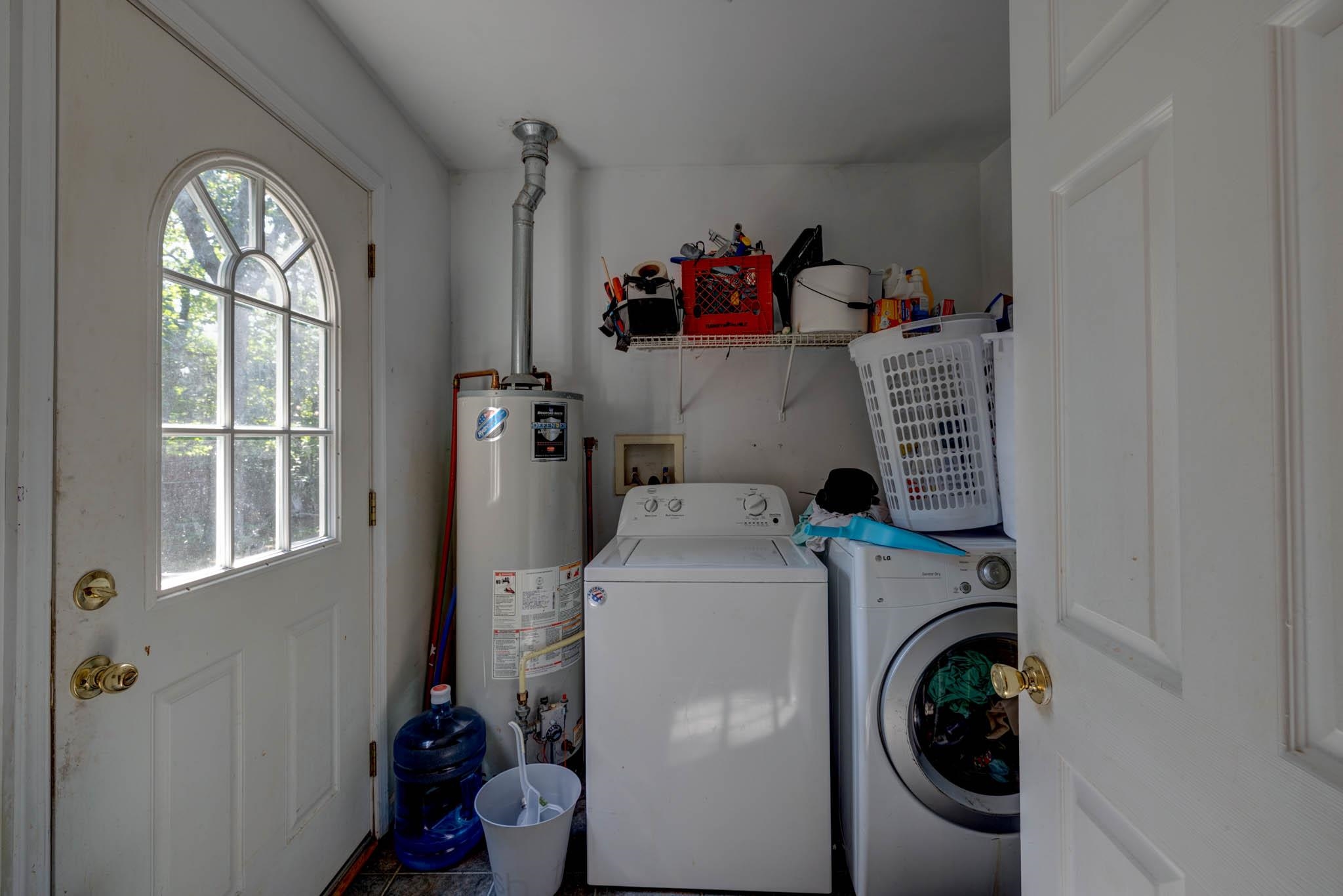 106 Delair Road Cape May, NJ 08204 - Photo 18 of 28 a utility room with dryer and washer