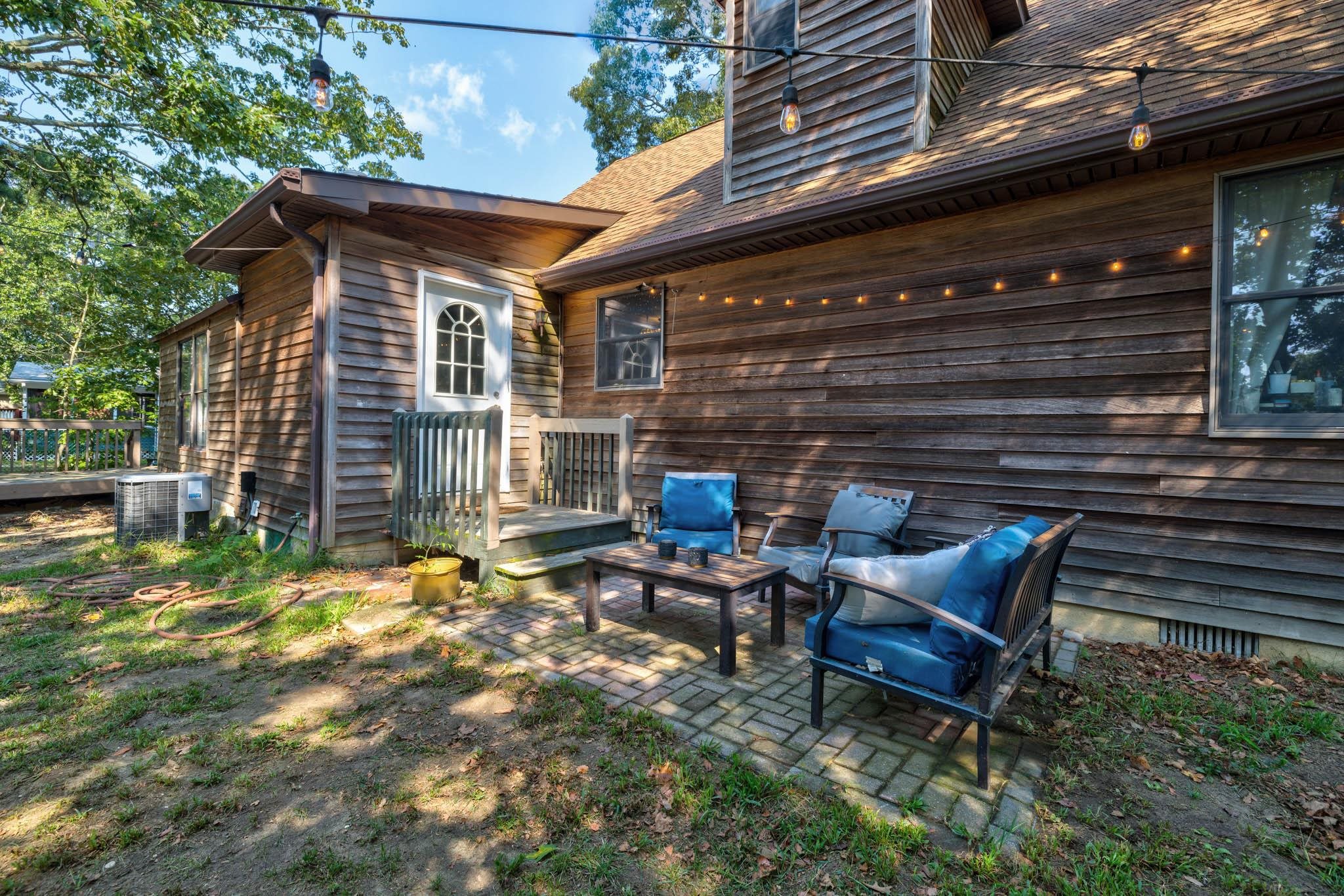 106 Delair Road Cape May, NJ 08204 - Photo 27 of 28 a view of a chairs and table in the patio