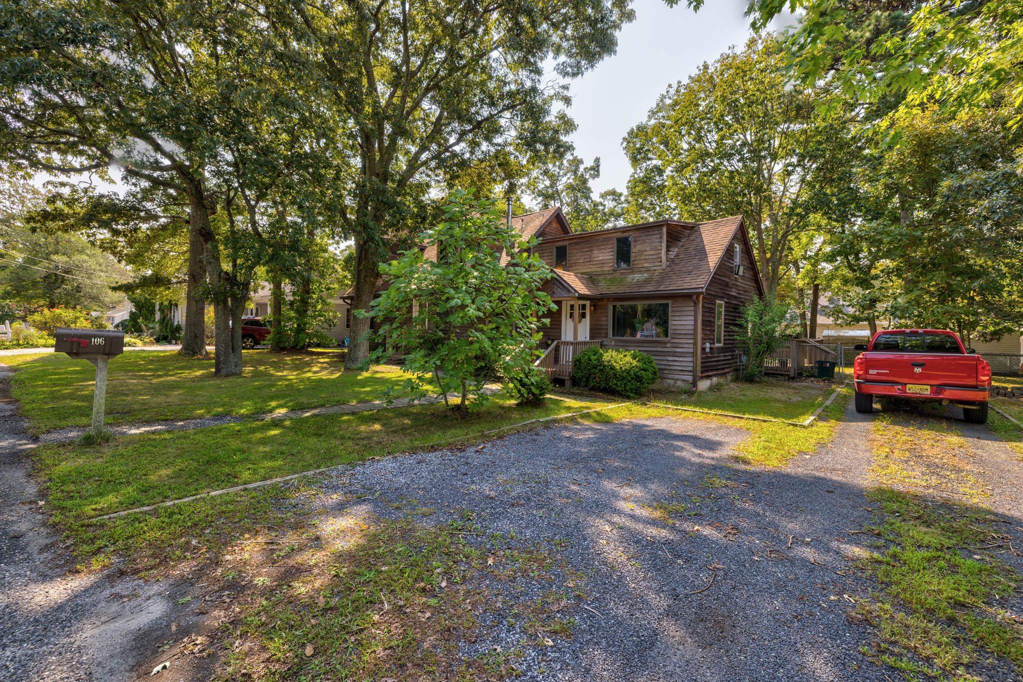 106 Delair Road Cape May, NJ 08204 - Photo 4 of 28 a view of a house with a yard