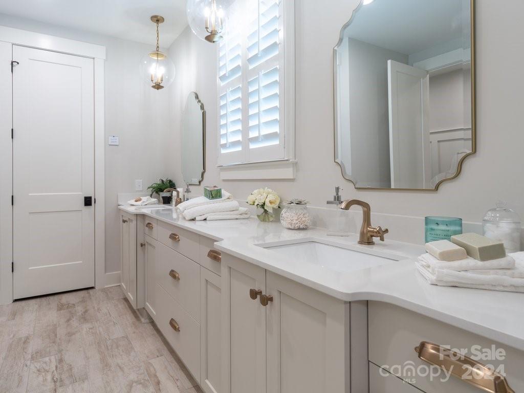 4298 Persimmon Road Lancaster, SC 29720 - Photo 13 of 46 a bathroom with a sink and a mirror