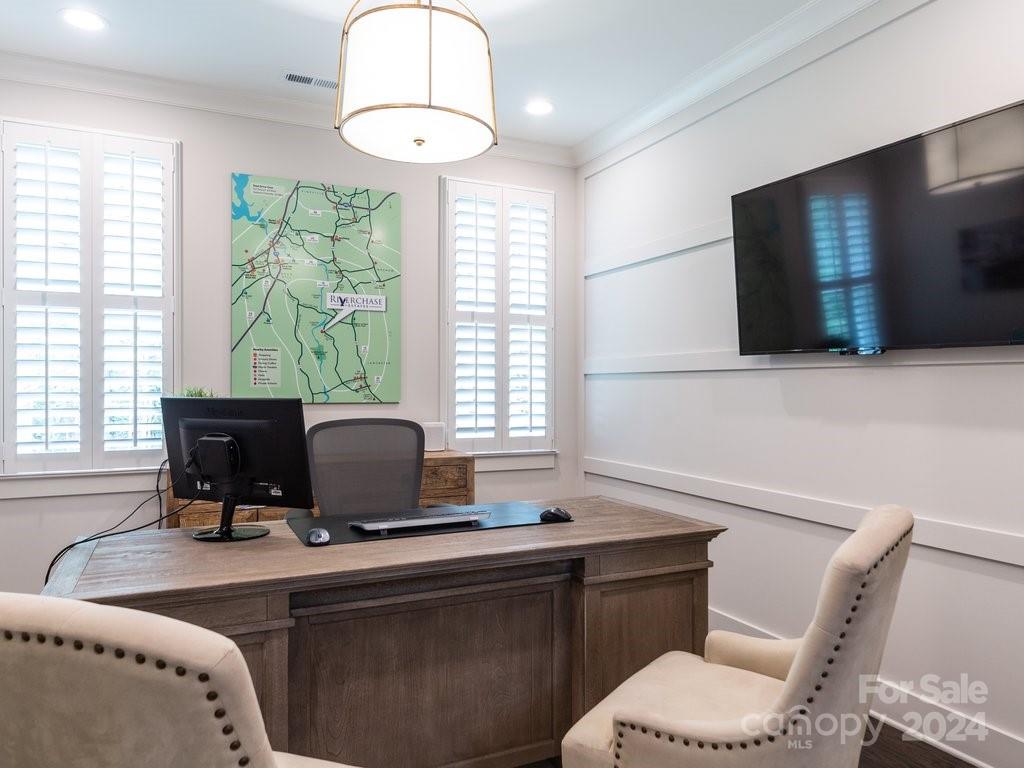 4298 Persimmon Road Lancaster, SC 29720 - Photo 23 of 46 a living room with furniture a window and a flat screen tv