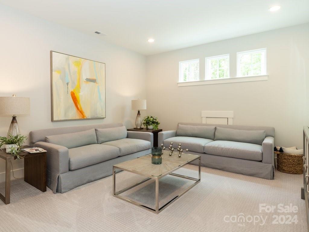 4298 Persimmon Road Lancaster, SC 29720 - Photo 29 of 46 a living room with furniture and a large window