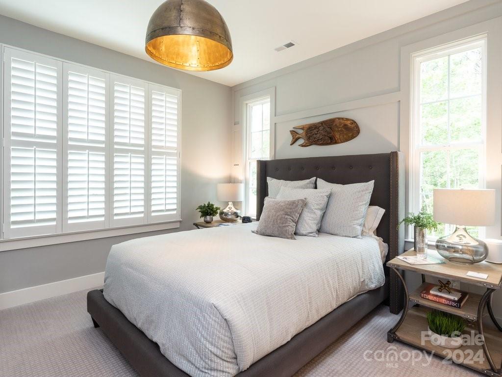 4298 Persimmon Road Lancaster, SC 29720 - Photo 32 of 46 a bedroom with a bed and a window