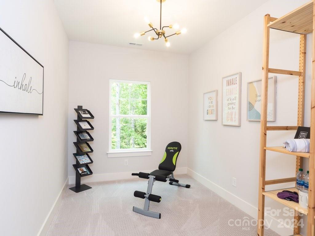 4298 Persimmon Road Lancaster, SC 29720 - Photo 37 of 46 a view of a workspace with furniture and a window