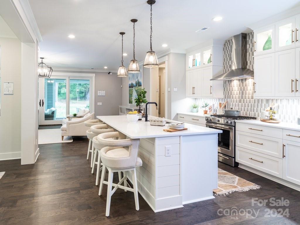4298 Persimmon Road Lancaster, SC 29720 - Photo 4 of 46 a kitchen with counter space dining table and chairs