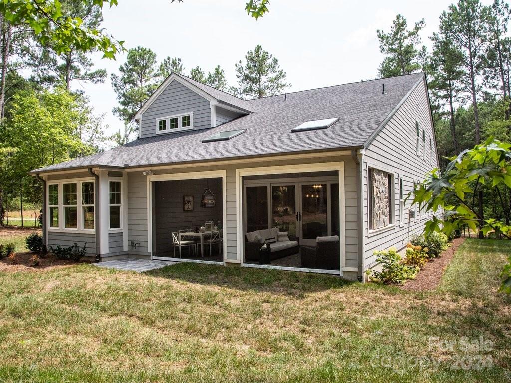 4298 Persimmon Road Lancaster, SC 29720 - Photo 44 of 46 a front view of a house with a yard in front of it