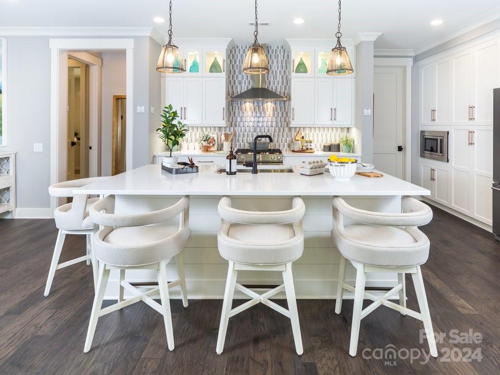 4298 Persimmon Road Lancaster, SC 29720 - Photo 5 of 46 a view of a dining room with furniture and wooden floor