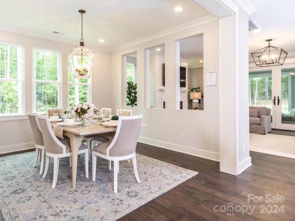 4298 Persimmon Road Lancaster, SC 29720 - Photo 9 of 46 a dining room with furniture window wooden floor