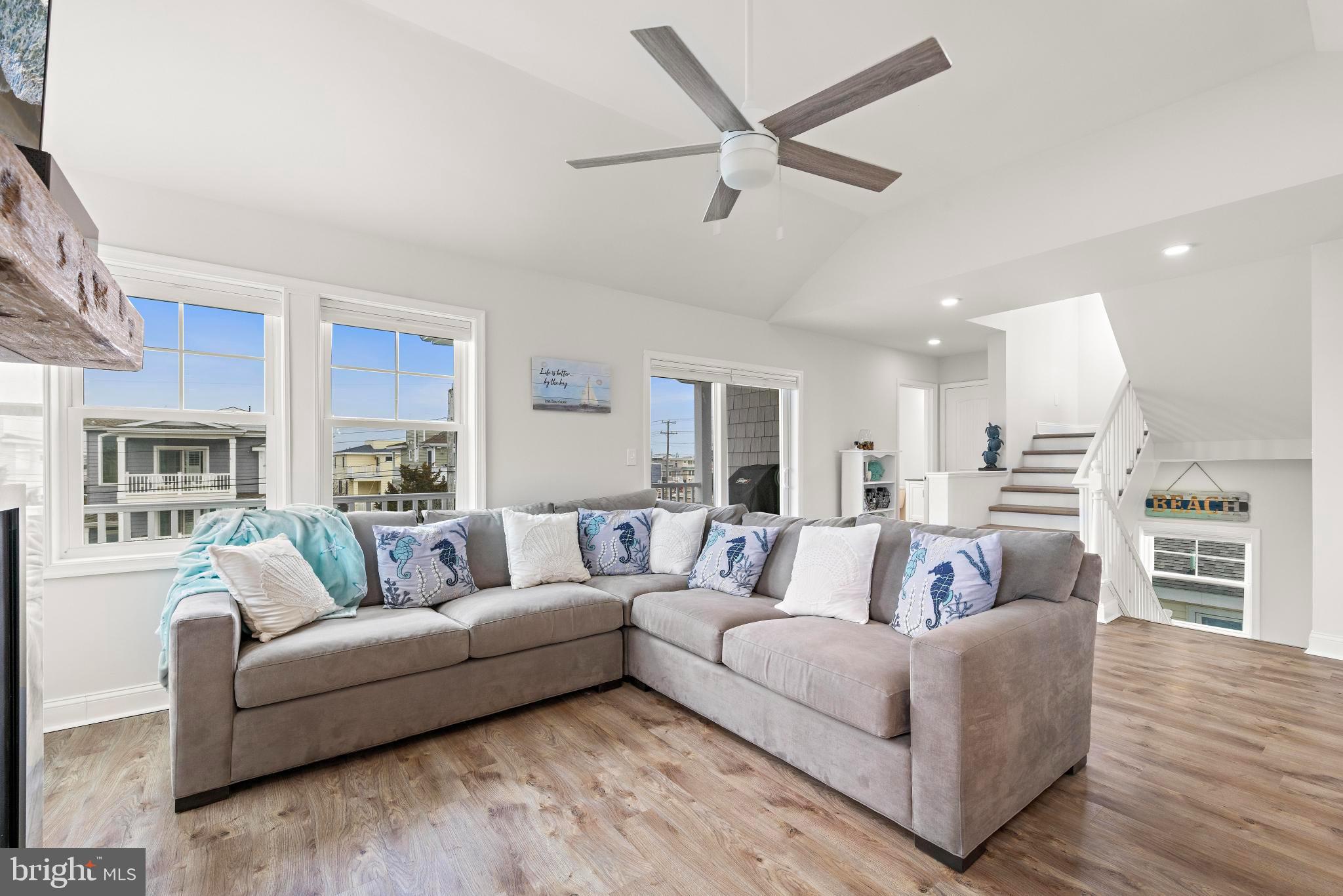 106 West 26th Street Ship Bottom, NJ 08008 - Photo 6 of 15 a living room with furniture and a wooden floor