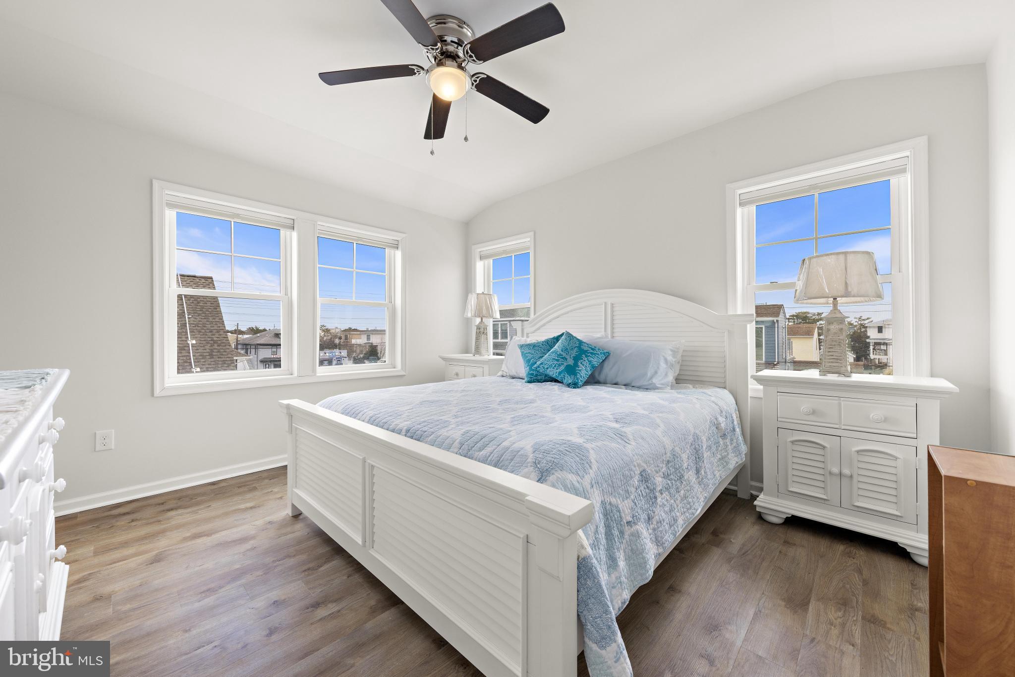 106 West 26th Street Ship Bottom, NJ 08008 - Photo 10 of 15 a spacious bedroom with a large bed and a window
