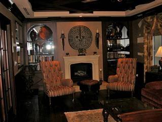 700 Highway 1, Unit 103 Jupiter, FL 33477 - Photo 32 of 36 a living room with furniture and a fireplace