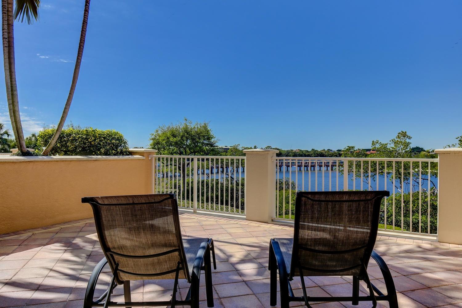 700 Highway 1, Unit 103 Jupiter, FL 33477 - Photo 6 of 36 a view of a chair and table in the balcony