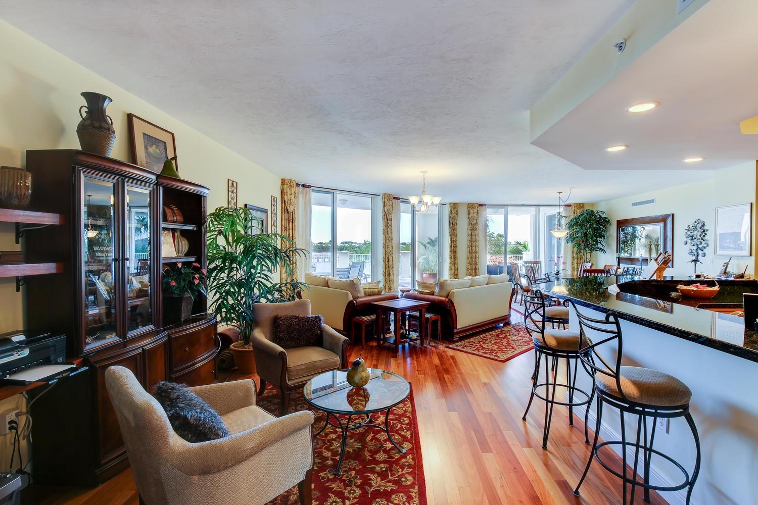 700 Highway 1, Unit 103 Jupiter, FL 33477 - Photo 10 of 36 a living room with furniture dining area and a large window