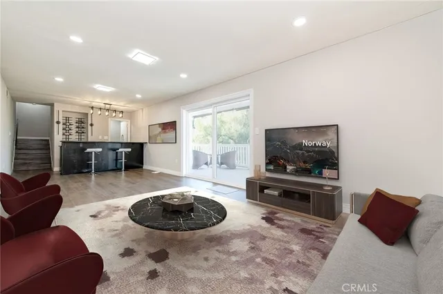 a view of a chair and table in the balcony