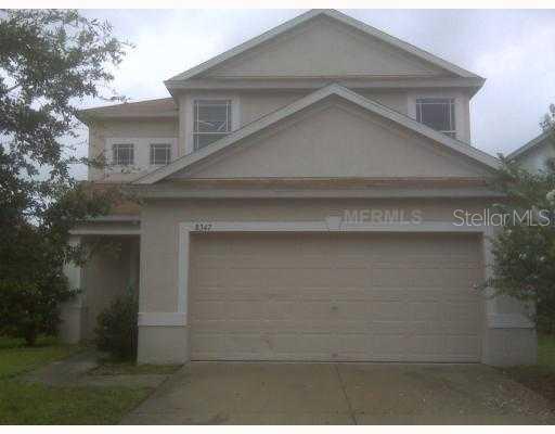 8347 Crescent Moon Drive New Port Richey, FL 34655 - Photo 1 of 1 a front view of a house