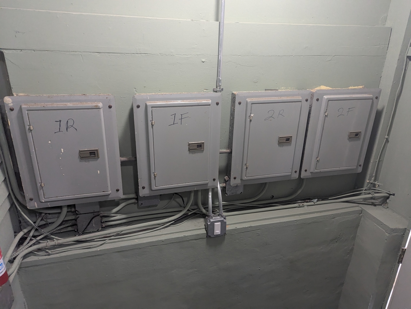 7548 West 61st Street Summit, IL 60501 - Photo 13 of 20 a room with water heater and a wooden door