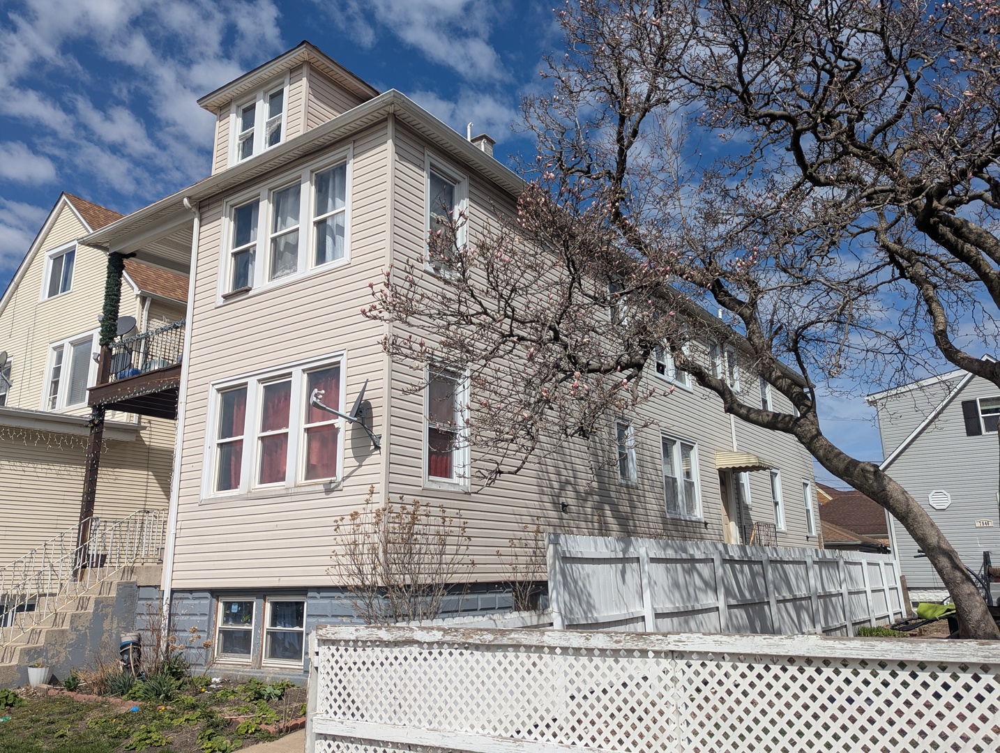 7548 West 61st Street Summit, IL 60501 - Photo 2 of 20 a front view of a house with a large tree