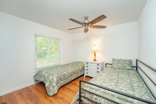a bedroom with a bed and a closet