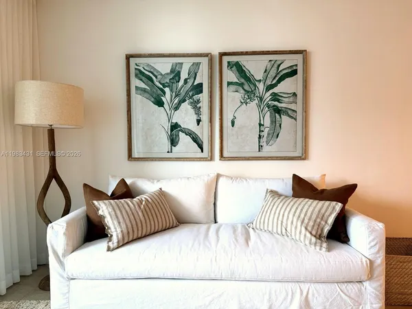 a bedroom with a bed and couch