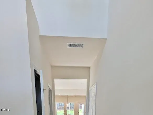 a view of flat screen tv and wooden floor in a room