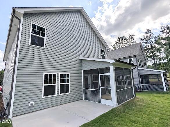 1003 Shovelhead Drive Durham, NC 27703 - Photo 19 of 21 a front view of a house with a garden