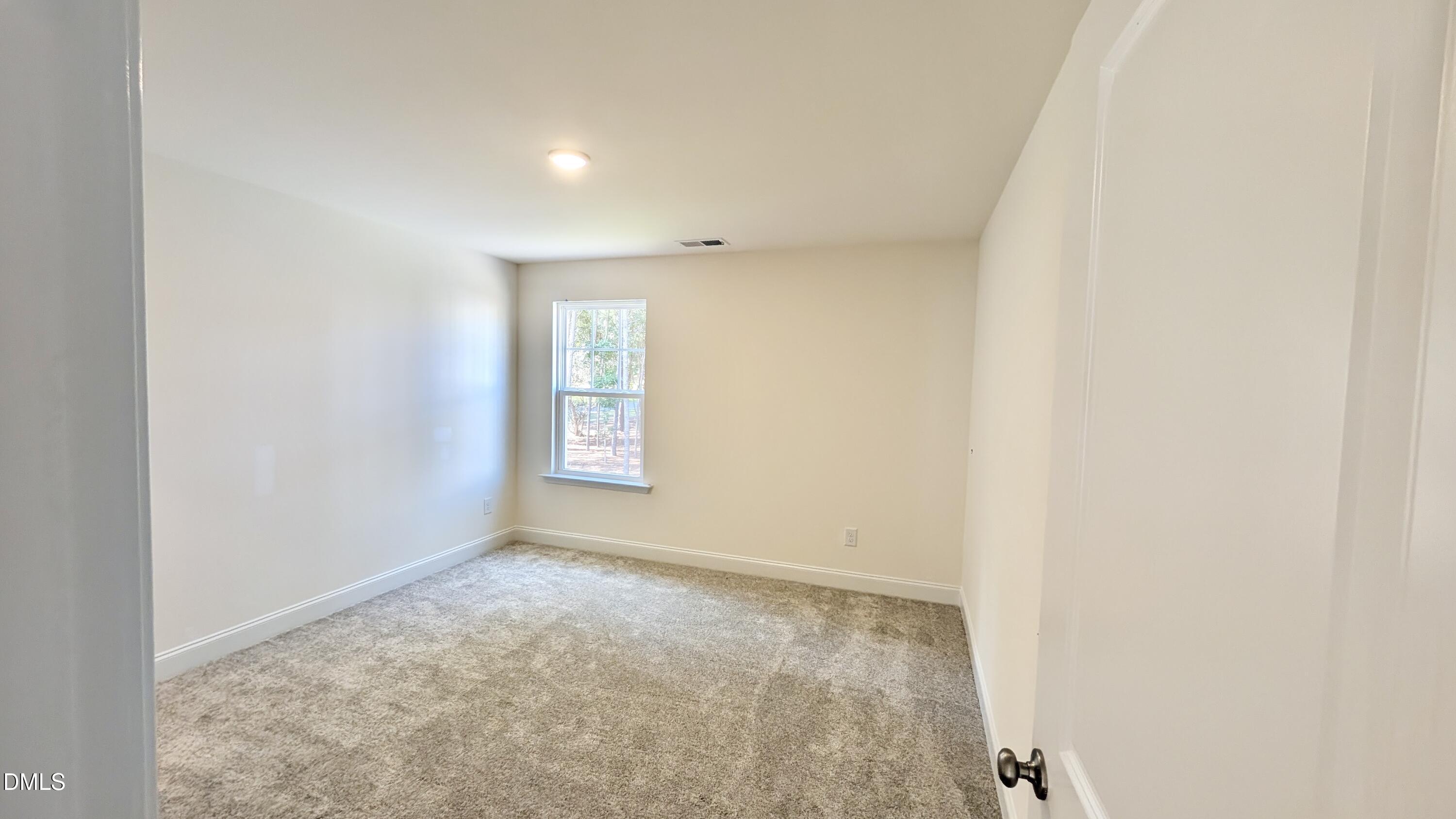 1003 Shovelhead Drive Durham, NC 27703 - Photo 9 of 21 a view of an empty room
