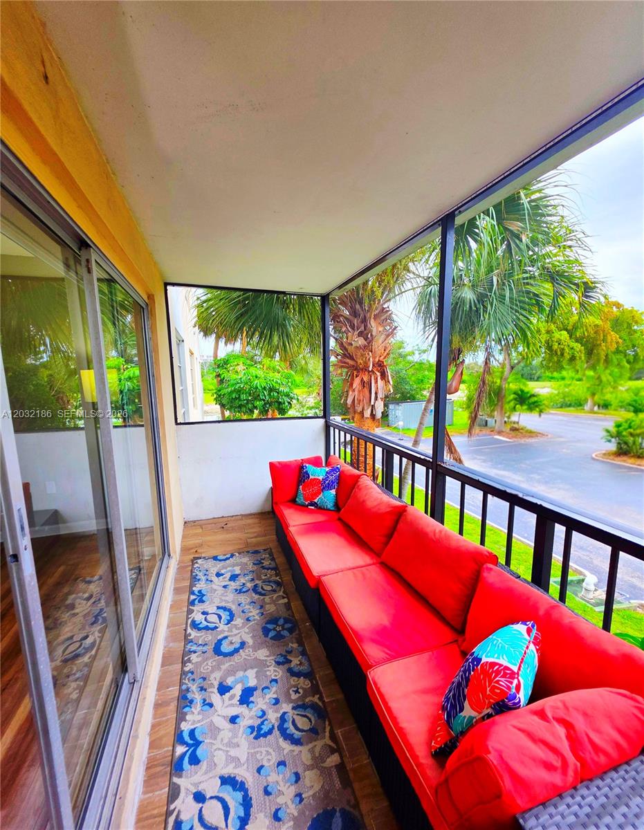 4164 Inverrary Drive, Unit 204 Lauderhill, FL 33319 - Photo 19 of 28 a sitting area in front of a window